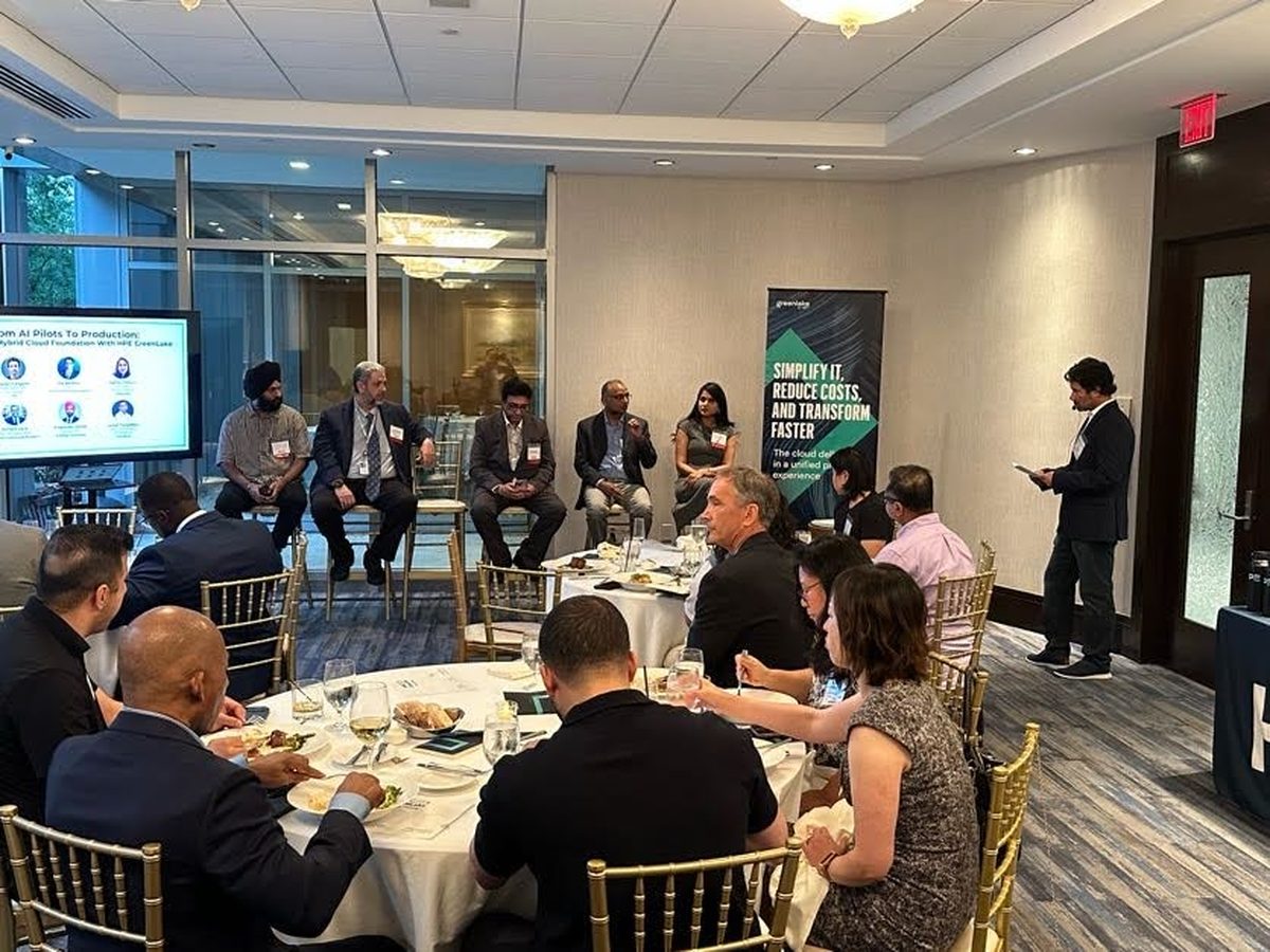A panel discussion during an HPE GreenLake program