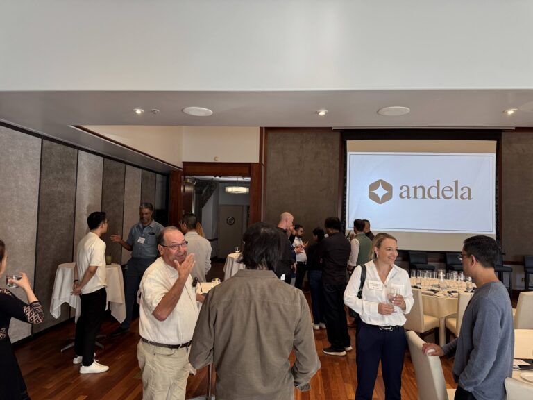 Attendees in conversation during the reception