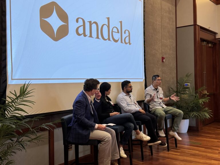 Attendees seated in front of the Andela screen