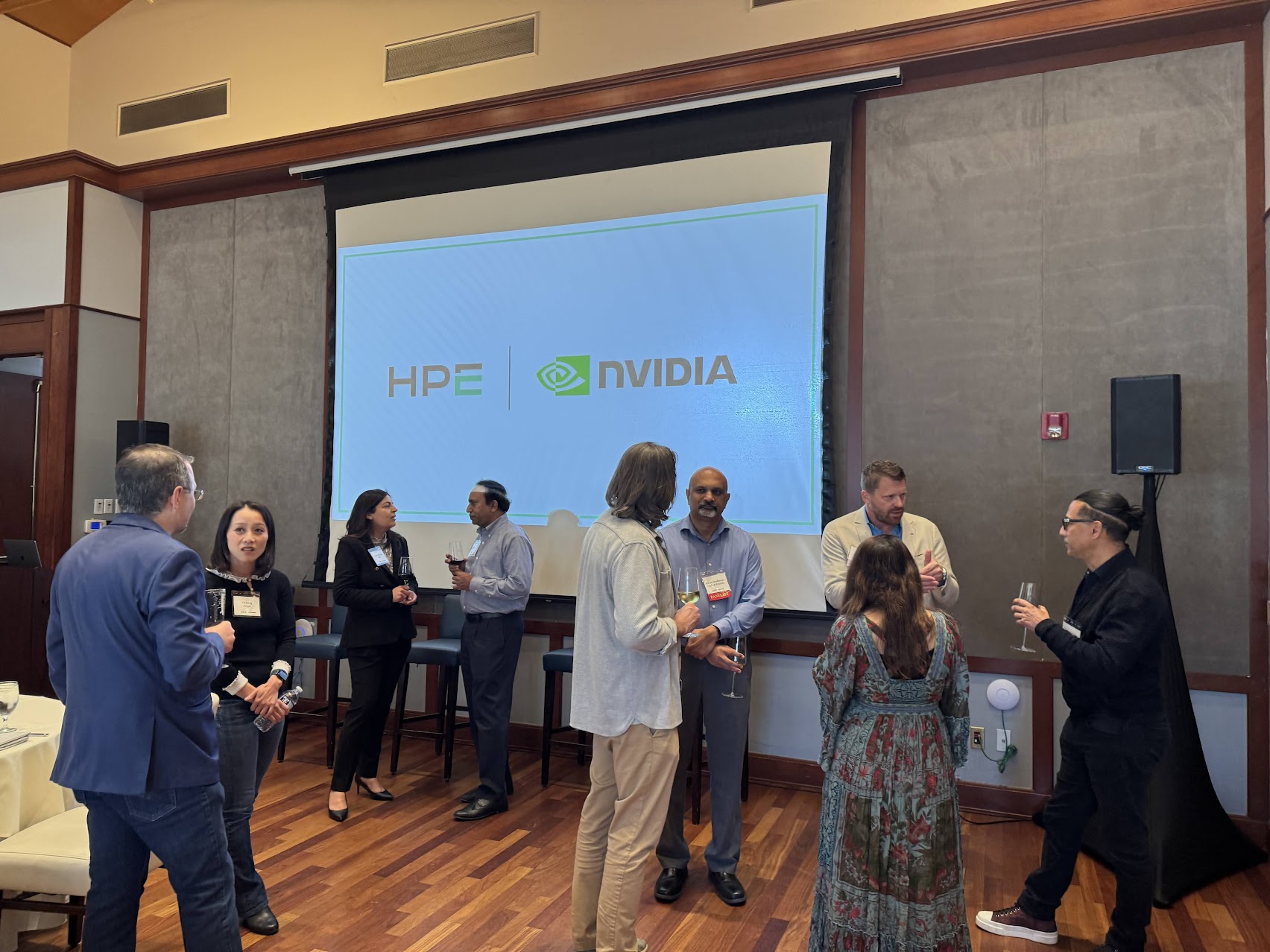 Executives networking before a BDI event begins