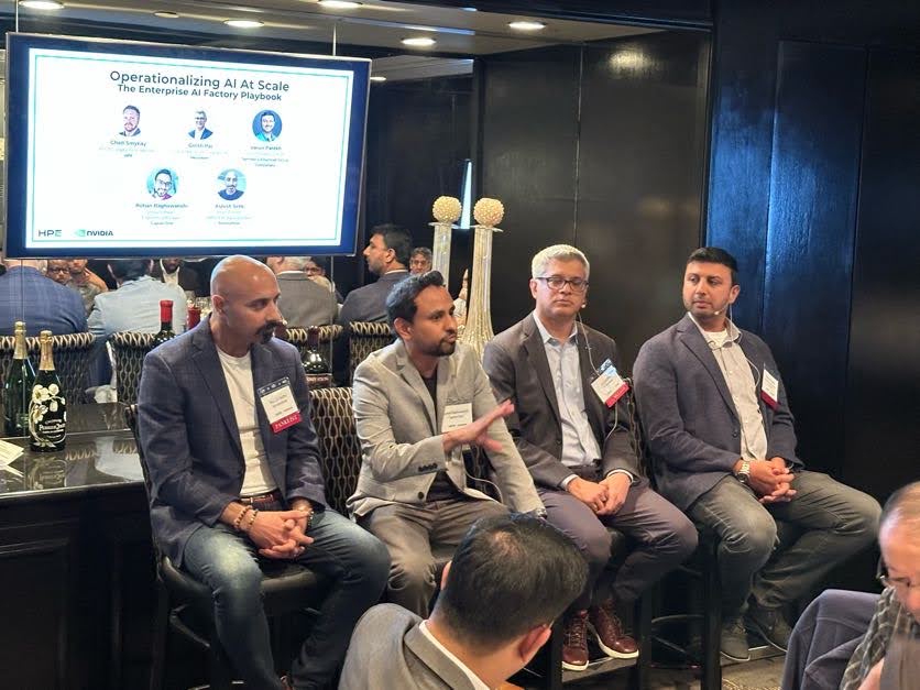 Panelists seated during a BDI executive discussion