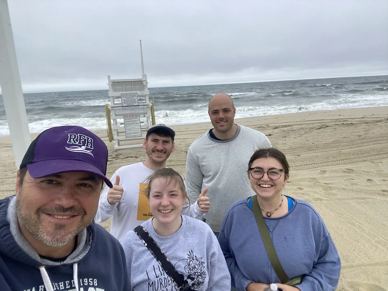BDI teammates together on the beach