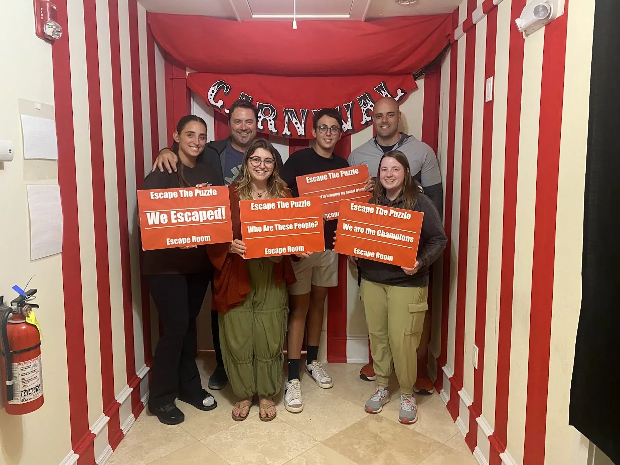 The BDI team celebrating after an escape room