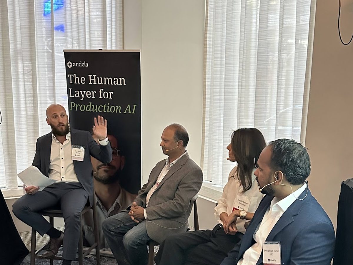 A moderated panel at an Andela executive dinner