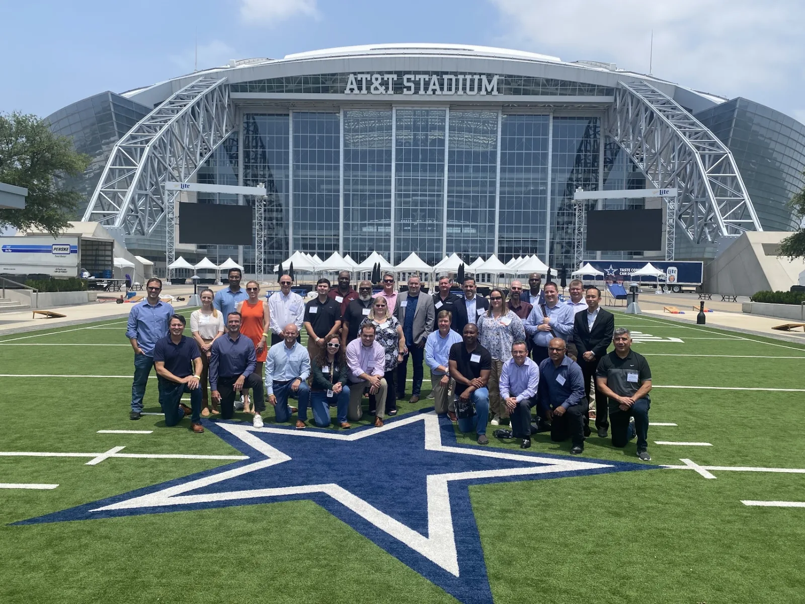 Executive attendees at an event at AT&T Stadium