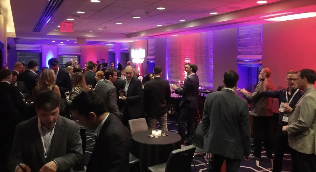 Guests networking at an evening reception